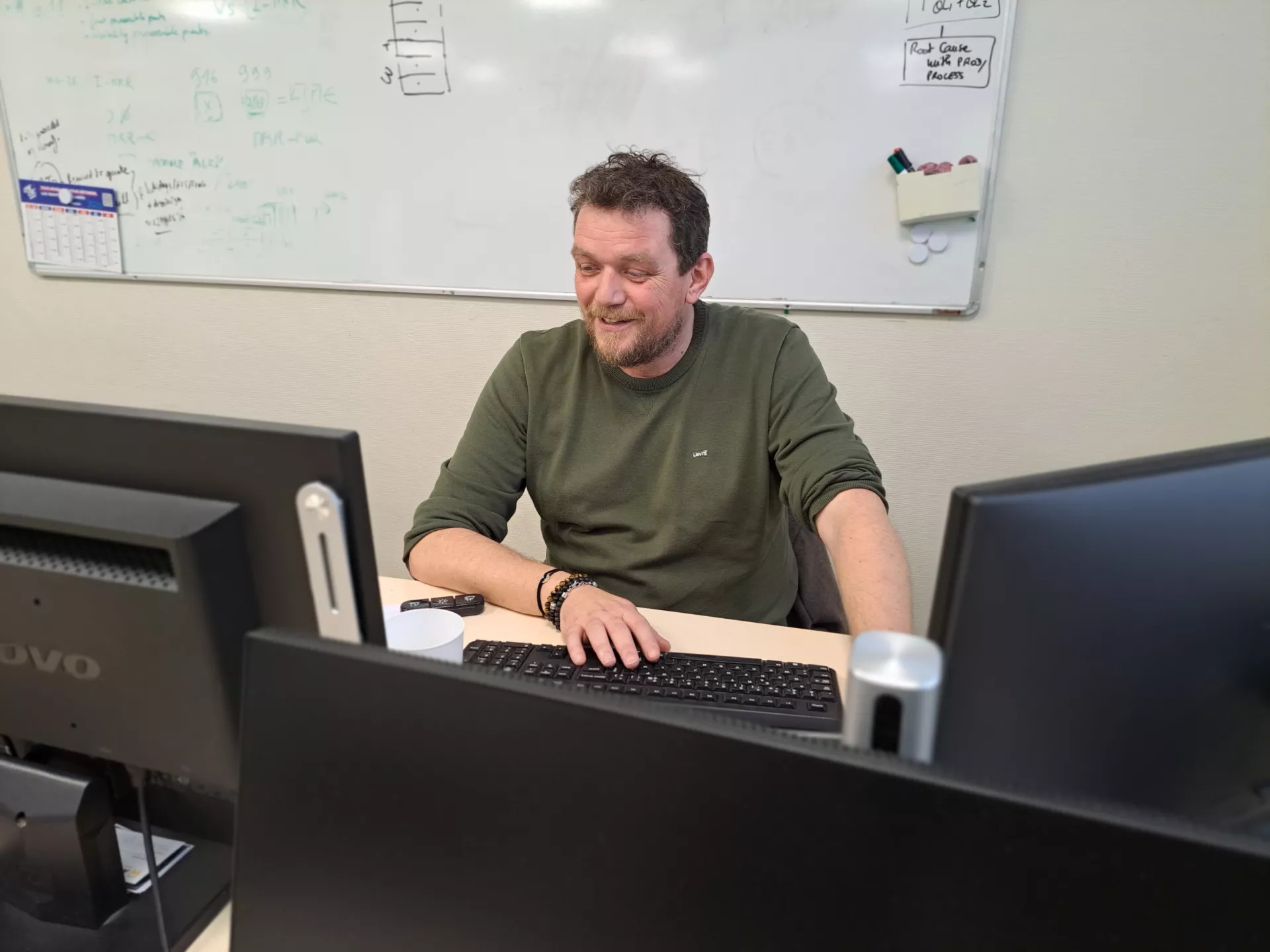 Photo of Dominique Bougard, Gigafactory employee, at his workstation.