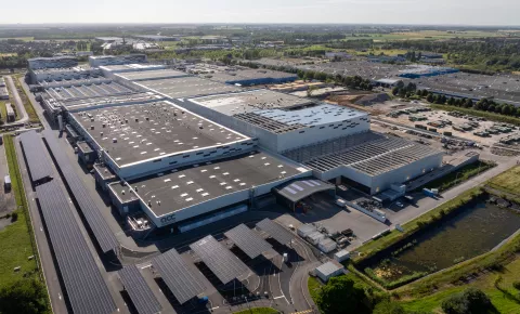 Photo of the gigafactory's main parking lot, covered with photovoltaic shades.