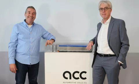 Photo of Yann Vincent and Allan Swann together next to a ACC module