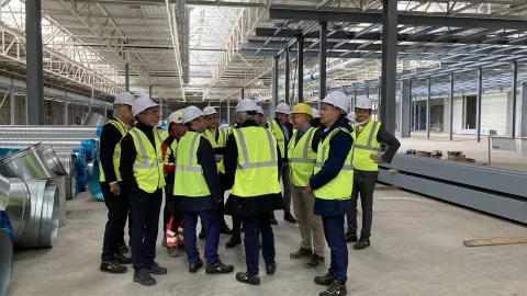 Excom members in ACC's gigafactory Excom members in ACC's gigafactory