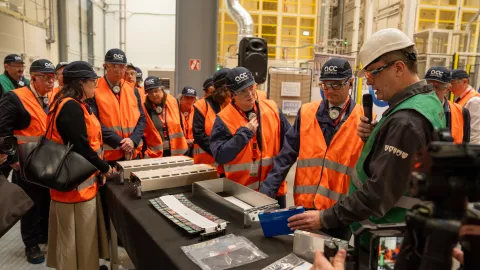 Sébastien MArtin module ACC Photo of French Minister Sebastien Martin with his delegation with a ACC module in a Gigafactory
